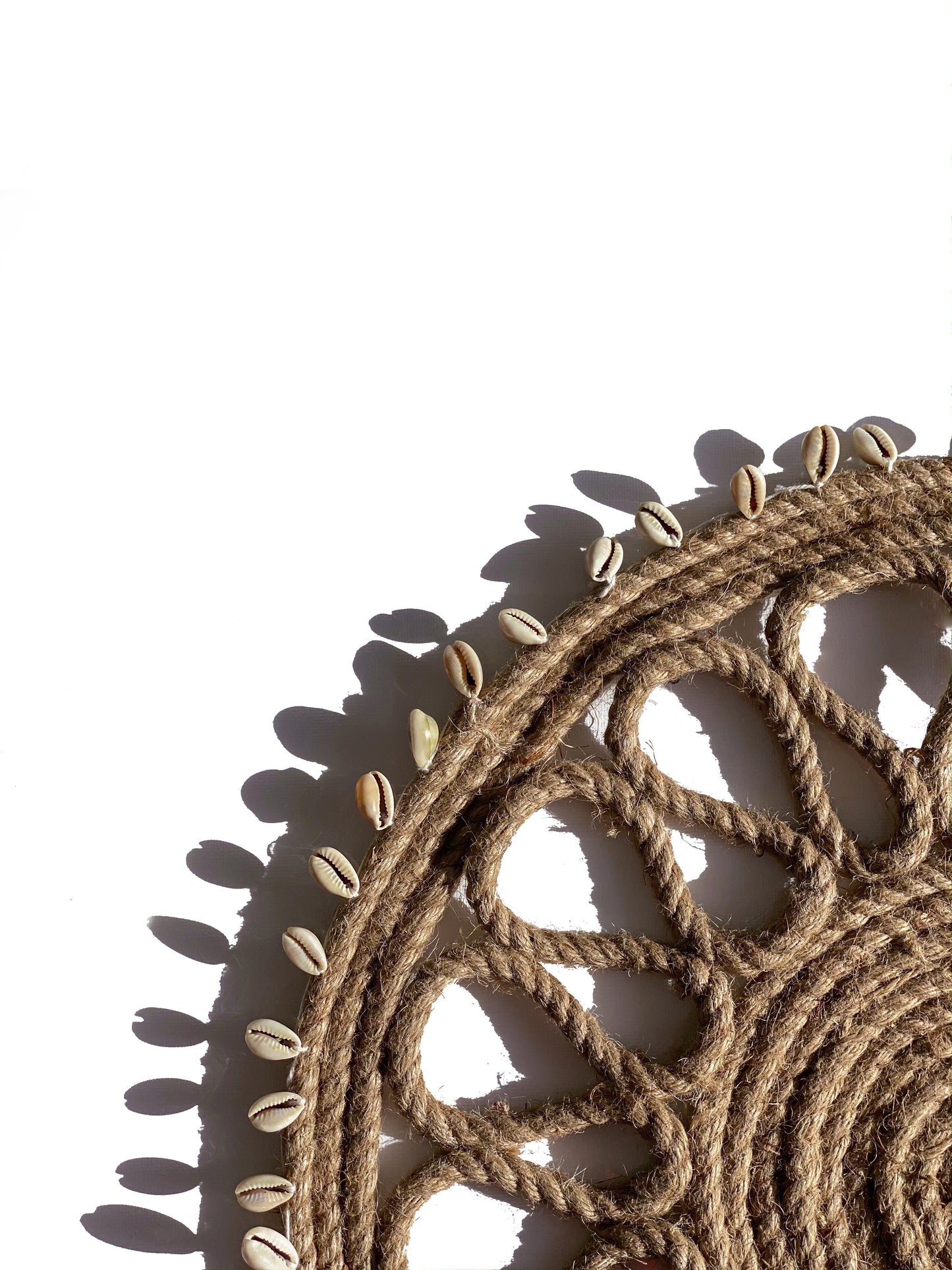 Hand made jute & cowrie placemat